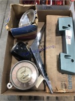 Old car parts--clock, light, door handle, emblem