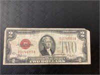 Red seal two dollar bank note.