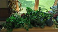 A BUNCH OF GREENERY PIECES AND A TWIG WREATH AND