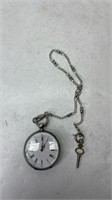 Wind up pocket watch with silver chain and wind up