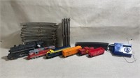 Ho scale train carts and engine with tracks and