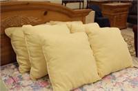 6 yellow throw pillows