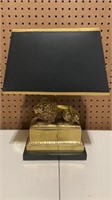 Black and Gold lion table top light 
14” tall,