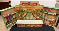 Vintage tin corner grocer toy display-with