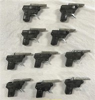 Ten Vintage Toy Clicker Guns