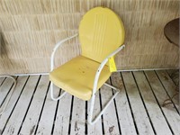 Yellow clamshell chair