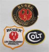 Patches and sticker includes Colt and Ruger.