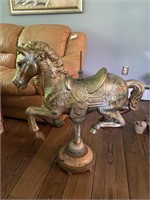 Plastic Rocking Horse On Old Lamp Stand.