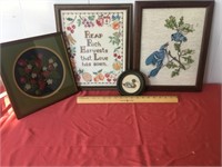 Four framed pieces of needlework. Duck is 3.5
