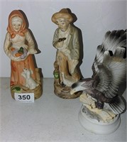 Old man, old lady, eagle statues