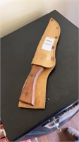 Hunting knife with soft leather sheath