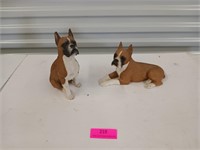 Two boxer dog statue