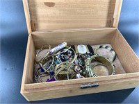Large wood treasure box filled with fashion bracel