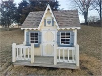 8'6"x6'6" wooden playhouse w/ 3'x8' porch