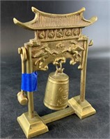 Miniature Oriental prayer bell with hammer/ about