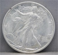 1944 UNC WALKING LIBERTY HALF DOLLAR.