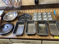 4 Revere pans, cast iron lid, misc pans