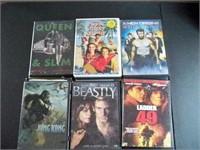 Variety of 21 DVD movies with travel bag