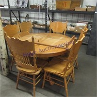 Pedestal table 48" w/ 21" leaf w/ 6 chairs