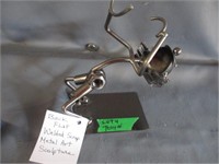 Back flip welded artwork