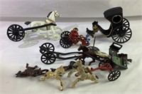 Lot of miscellaneous cast-iron wagon parts
