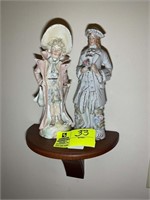 MAN AND WOMAN FIGURINES APROX 11 IN TALL