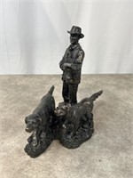Hunter with dogs sculpture