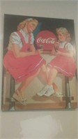 I got like Coca-Cola wall art two girls on s