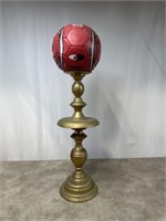 Gold painted trophy with a soccer ball on top