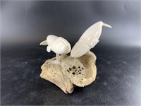 Charles Edwards carved pair of whales set on a