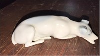 Pietter porcelain dog laying down 5 inches long,