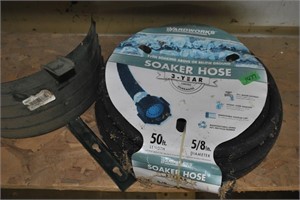 new soaker hose and holder