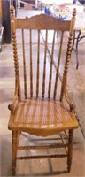 Carved oak spindle back dining chair w/ cane seat,