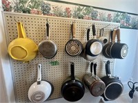 Wall of Pots and Pans with Lids