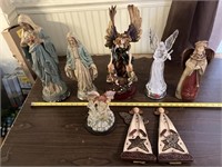 Angel figurines , some damage