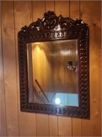 Beautiful large dark wood framed beveled mirror