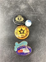 Several pins including 1 from RMS Queen Mary