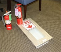 Two Fire extinguishers AND metal inwall storage ca