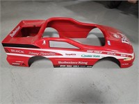 Plastic body for a go-cart