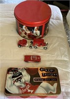 Coca Cola cars and tins