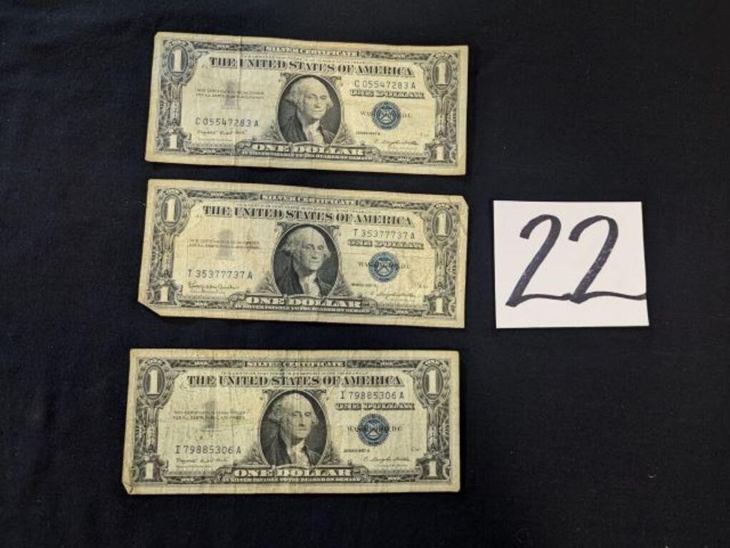 3- $1 Bills with Blue Ink Printed - some staining