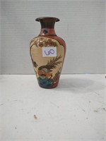 Beautiful enameled brass vase with flowers and