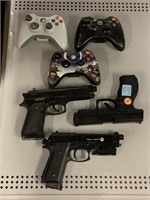 Xbox Gaming controllers and pellet guns.