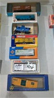 7 train cars in the box - including a caboose,
