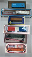 10 toy model train cars in six boxes - cargo