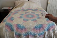 Double pastel star pattern quilt