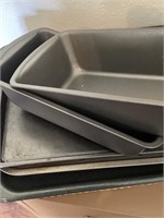 Miscellaneous bakeware pans, cutting boards