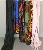 Group of women's designer scarves including