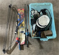 Bin w/ Mossy Oak Bow, Fishing Rods, Hard Hat, And