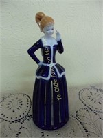 Porcelain Figurine with Open Skirt Base